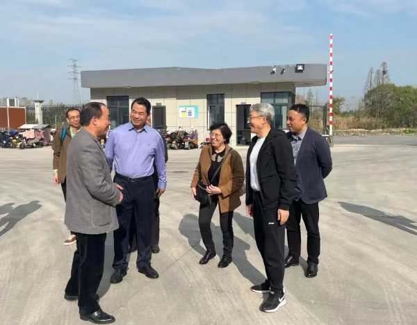 热烈欢迎中国林产工业协会会长王满一行莅临永吉地板参观指导